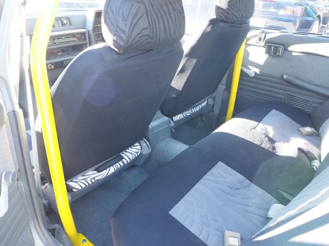 スカイライン 　車検整備付き　５ＭＴ　Ｆ・Ｓ・Ｒエアロ　社外ウッドハンドル　４点式ロールバー　ＨＯＳＨＩＮＯＲＡＣＩＮＧホイール　ローダウン　社外マフラー　Ｒウィング（ゲタ羽）（24枚目）