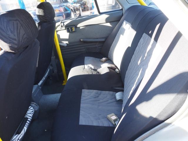 スカイライン 　車検整備付き　５ＭＴ　Ｆ・Ｓ・Ｒエアロ　社外ウッドハンドル　４点式ロールバー　ＨＯＳＨＩＮＯＲＡＣＩＮＧホイール　ローダウン　社外マフラー　Ｒウィング（ゲタ羽）（25枚目）