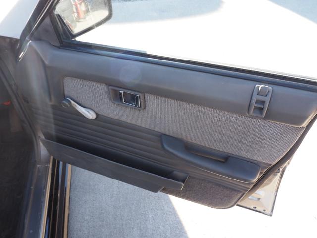 スカイライン 　車検整備付き　５ＭＴ　Ｆ・Ｓ・Ｒエアロ　社外ウッドハンドル　４点式ロールバー　ＨＯＳＨＩＮＯＲＡＣＩＮＧホイール　ローダウン　社外マフラー　Ｒウィング（ゲタ羽）（28枚目）