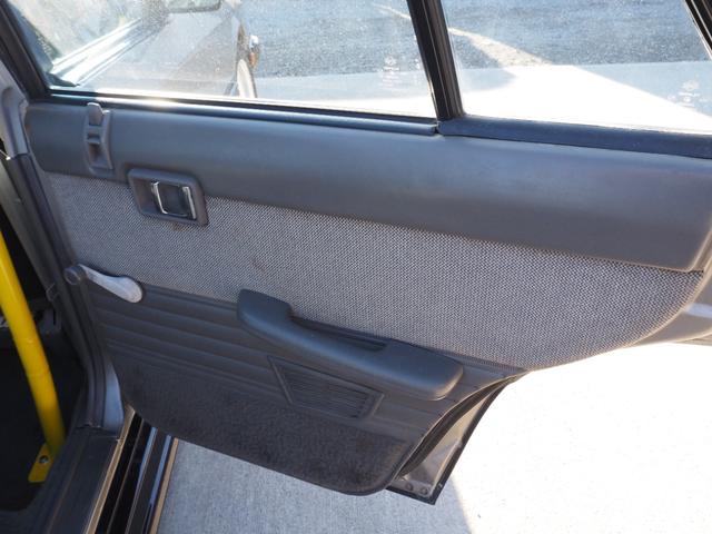 スカイライン 　車検整備付き　５ＭＴ　Ｆ・Ｓ・Ｒエアロ　社外ウッドハンドル　４点式ロールバー　ＨＯＳＨＩＮＯＲＡＣＩＮＧホイール　ローダウン　社外マフラー　Ｒウィング（ゲタ羽）（29枚目）