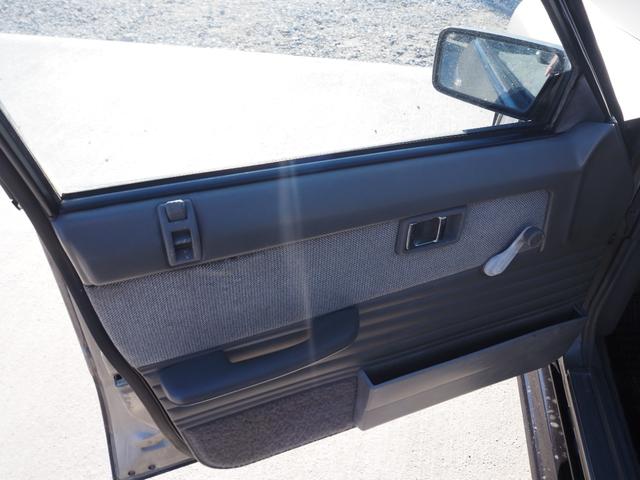 スカイライン 　車検整備付き　５ＭＴ　Ｆ・Ｓ・Ｒエアロ　社外ウッドハンドル　４点式ロールバー　ＨＯＳＨＩＮＯＲＡＣＩＮＧホイール　ローダウン　社外マフラー　Ｒウィング（ゲタ羽）（30枚目）