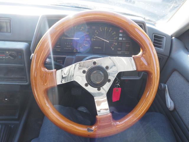 スカイライン 　車検整備付き　５ＭＴ　Ｆ・Ｓ・Ｒエアロ　社外ウッドハンドル　４点式ロールバー　ＨＯＳＨＩＮＯＲＡＣＩＮＧホイール　ローダウン　社外マフラー　Ｒウィング（ゲタ羽）（33枚目）