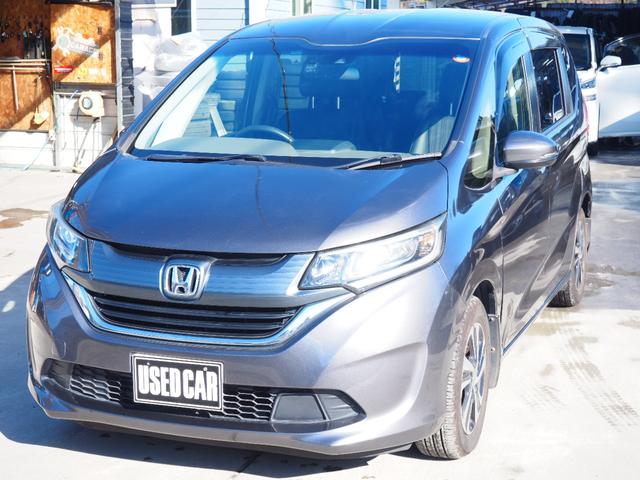 フリード G・ホンダセンシング 車検令和9年11月 1年保証 ナビ バックカメラ 後席モニター 衝突軽減ブレーキ ホンダセンシング プッシュスタート 両側パワスラ ハーフレザーシート ETC LEDヘッドライト(2枚目)