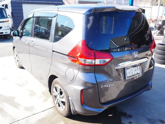 フリード G・ホンダセンシング 車検令和9年11月 1年保証 ナビ バックカメラ 後席モニター 衝突軽減ブレーキ ホンダセンシング プッシュスタート 両側パワスラ ハーフレザーシート ETC LEDヘッドライト(6枚目)
