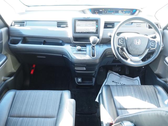 フリード G・ホンダセンシング 車検令和9年11月 1年保証 ナビ バックカメラ 後席モニター 衝突軽減ブレーキ ホンダセンシング プッシュスタート 両側パワスラ ハーフレザーシート ETC LEDヘッドライト(12枚目)