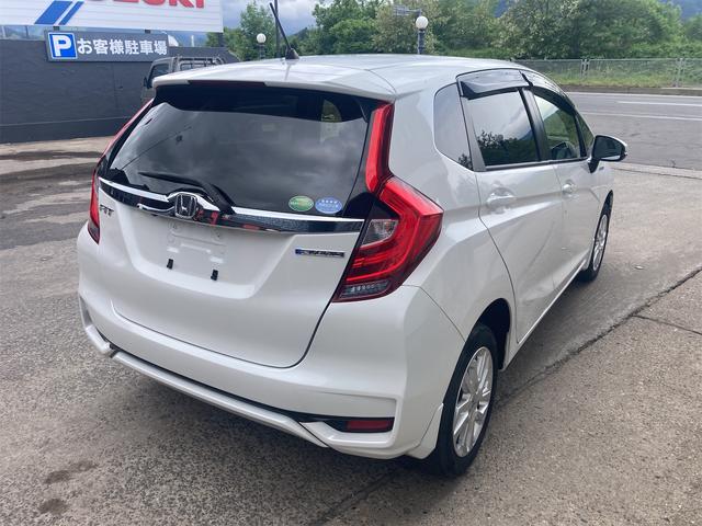 フィットハイブリッド Ｌ　ホンダセンシング　４ＷＤ　純正８インチインターナビフルセグＴＶ　Ｂカメラ　　クルーズコントロール　ハーフレザーシート　ナビ装着フルパッケージ　ビルトインＥＴＣホンダセンシング　純正エンジンスターター（8枚目）