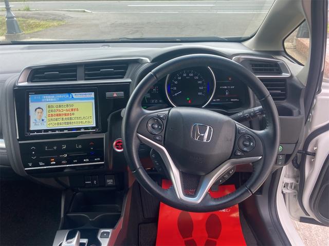 フィットハイブリッド Ｌ　ホンダセンシング　４ＷＤ　純正８インチインターナビフルセグＴＶ　Ｂカメラ　　クルーズコントロール　ハーフレザーシート　ナビ装着フルパッケージ　ビルトインＥＴＣホンダセンシング　純正エンジンスターター（15枚目）
