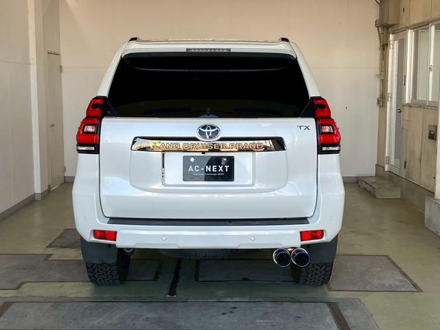 ランドクルーザープラド TX Lパッケージ 70thアニバーサリーリミテッド 1オーナー ムーンルーフ JAOSスキッププレート ガナドールマフラー RAYS18インチAW リフトアップ 9型ナビ バックカメラ シートヒーター 茶側シート LEDライト ACC セーフティセンス(6枚目)