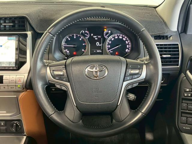 ランドクルーザープラド TX Lパッケージ 70thアニバーサリーリミテッド 1オーナー ムーンルーフ JAOSスキッププレート ガナドールマフラー RAYS18インチAW リフトアップ 9型ナビ バックカメラ シートヒーター 茶側シート LEDライト ACC セーフティセンス(14枚目)