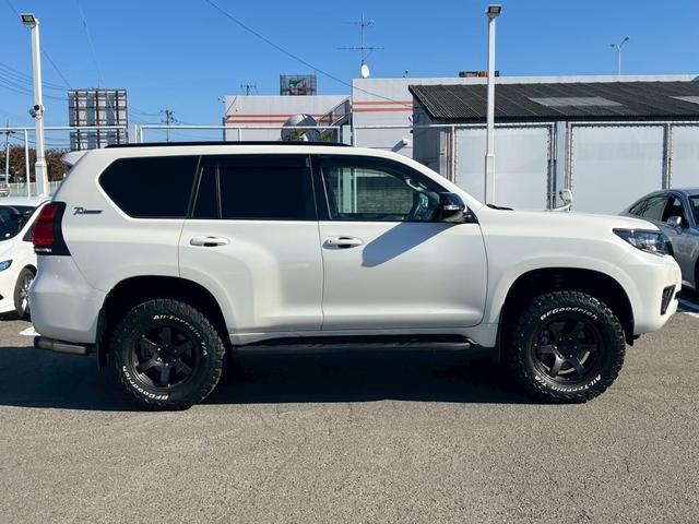 ランドクルーザープラド TX Lパッケージ 70thアニバーサリーリミテッド 1オーナー ムーンルーフ JAOSスキッププレート ガナドールマフラー RAYS18インチAW リフトアップ 9型ナビ バックカメラ シートヒーター 茶側シート LEDライト ACC セーフティセンス(32枚目)