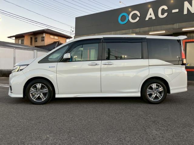 ステップワゴンスパーダ スパーダハイブリッド　Ｇ・ＥＸ　ホンダセンシング　純正９インチナビ　１０インチフリップダウンモニター　全周囲カメラ　ＡＣＣ　ＬＥＤライト　両側電動ドア　衝突軽減ブレーキ　ドラレコ　後席エアコン　ＥＴＣ　横滑り防止　シートヒーター　ハーフレザーシート（5枚目）