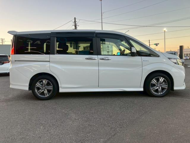 ステップワゴンスパーダ スパーダハイブリッド　Ｇ・ＥＸ　ホンダセンシング　純正９インチナビ　１０インチフリップダウンモニター　全周囲カメラ　ＡＣＣ　ＬＥＤライト　両側電動ドア　衝突軽減ブレーキ　ドラレコ　後席エアコン　ＥＴＣ　横滑り防止　シートヒーター　ハーフレザーシート（28枚目）