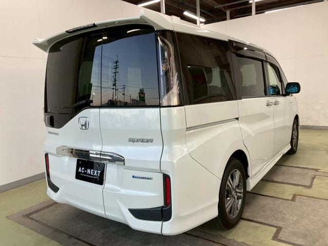 ステップワゴンスパーダ スパーダハイブリッド　Ｇ・ＥＸ　ホンダセンシング　純正９インチナビ　１０インチフリップダウンモニター　全周囲カメラ　ＡＣＣ　ＬＥＤライト　両側電動ドア　衝突軽減ブレーキ　ドラレコ　後席エアコン　ＥＴＣ　横滑り防止　シートヒーター　ハーフレザーシート（29枚目）