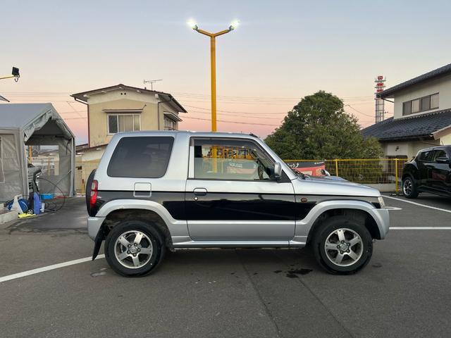 パジェロミニ ＶＲ　１年保証付　４ＷＤ　ナビ・ＴＶ（フルセグ）　純正１５インチアルミ　キーレスエントリー　Ｂｌｕｅｔｏｏｔｈ接続可（8枚目）