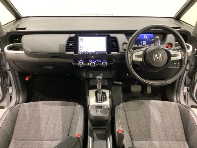 フィット ｅ：ＨＥＶホーム　いまコレ＋新品・リモコンエンジンスターター付／ＥＴＣ車載器／純正メモリーナビ／光触媒抗菌消臭施工済（10枚目）