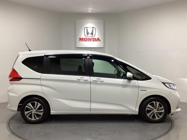 フリードハイブリッド ハイブリッド・Ｇホンダセンシング　純正メモリーナビ／リア席モニター／シートヒーター／バックカメラ／ＥＴＣ／ＵＳＢ／Ｂｌｕｅｔｏｏｔｈ接続／フルセグＴＶ光触媒抗菌消臭施工済（7枚目）