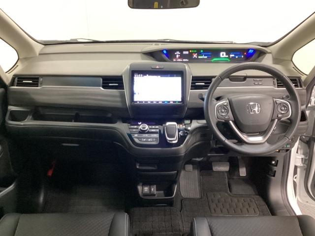 フリードハイブリッド ハイブリッド・Ｇホンダセンシング　純正メモリーナビ／リア席モニター／シートヒーター／バックカメラ／ＥＴＣ／ＵＳＢ／Ｂｌｕｅｔｏｏｔｈ接続／フルセグＴＶ光触媒抗菌消臭施工済（8枚目）