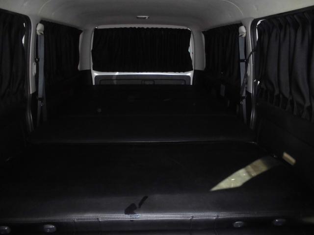 ハイエースバン スーパーＧＬ　ダークプライム　純正ナビ＆フルセグテレビ＆ＤＶＤ＆Ｂｌｕｅｔｏｏｔｈ　バックカメラ　ＥＴＣ　両側スライドドア　モデリスタエアロ＆リアスポイラー　社外アルミホイール　ハーフレザーシート　スマートキー　ベットキット（48枚目）