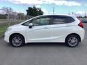 フィット １３Ｇ・Ｆパッケージ　４ＷＤ　横滑り防止装置　ＥＴＣ　アルミホイール　スマートキー　アイドリングストップ　メモリーナビ　バックカメラ　フルセグ（5枚目）