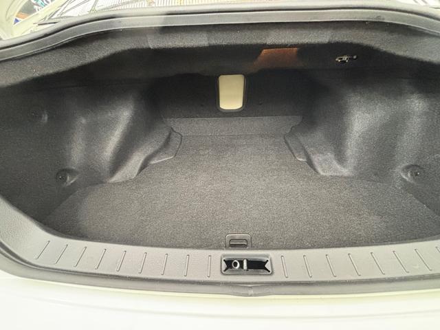 スカイライン ２５０ＧＴ　ナビ／テレビ／バックカメラ／社外マフラー／前席Ｐシート／黒革調シートカバー／ＥＴＣ／ＨＩＤヘッドライト／プッシュスタート／スマートキー（25枚目）