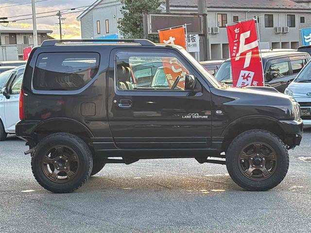ジムニー ランドベンチャー 4WD ETC ナビ TV アルミホイール キーレスエントリー 電動格納ミラー シートヒーター 革シート AT 衝突安全ボディ CD ABS エアコン パワーステアリング パワーウィンドウ(5枚目)