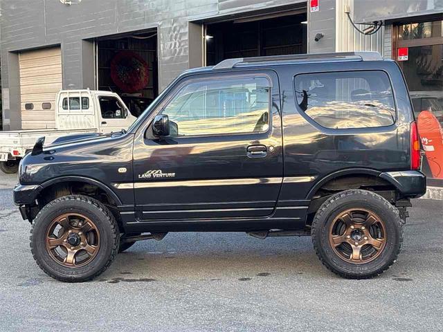 ジムニー ランドベンチャー 4WD ETC ナビ TV アルミホイール キーレスエントリー 電動格納ミラー シートヒーター 革シート AT 衝突安全ボディ CD ABS エアコン パワーステアリング パワーウィンドウ(9枚目)