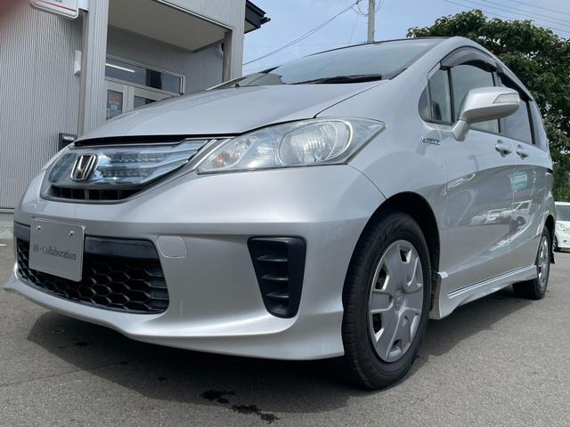 フリードハイブリッド ジャストセレクション　社外ナビ　ＴＶ　ＤＶＤ　エンスタ　ＥＴＣ　スマートキー　片側パワースライドドア　ＨＩＤライト　７人乗　横滑り防止装置　内外装クリーニング済（9枚目）