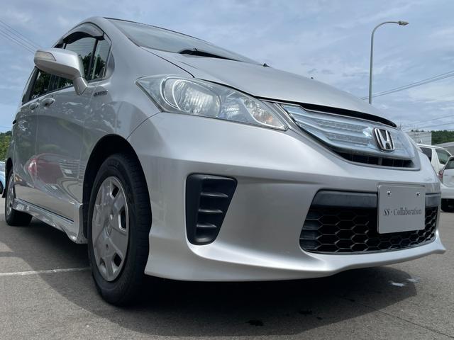 フリードハイブリッド ジャストセレクション　社外ナビ　ＴＶ　ＤＶＤ　エンスタ　ＥＴＣ　スマートキー　片側パワースライドドア　ＨＩＤライト　７人乗　横滑り防止装置　内外装クリーニング済（10枚目）