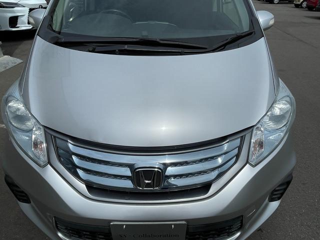 フリードハイブリッド ジャストセレクション　社外ナビ　ＴＶ　ＤＶＤ　エンスタ　ＥＴＣ　スマートキー　片側パワースライドドア　ＨＩＤライト　７人乗　横滑り防止装置　内外装クリーニング済（13枚目）