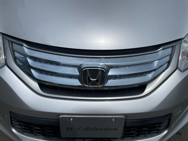 フリードハイブリッド ジャストセレクション　社外ナビ　ＴＶ　ＤＶＤ　エンスタ　ＥＴＣ　スマートキー　片側パワースライドドア　ＨＩＤライト　７人乗　横滑り防止装置　内外装クリーニング済（14枚目）