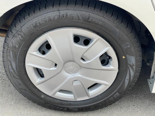 フリードハイブリッド ジャストセレクション　社外ナビ　ＴＶ　ＤＶＤ　エンスタ　ＥＴＣ　スマートキー　片側パワースライドドア　ＨＩＤライト　７人乗　横滑り防止装置　内外装クリーニング済（18枚目）