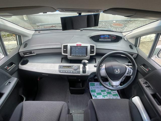 フリードハイブリッド ジャストセレクション　社外ナビ　ＴＶ　ＤＶＤ　エンスタ　ＥＴＣ　スマートキー　片側パワースライドドア　ＨＩＤライト　７人乗　横滑り防止装置　内外装クリーニング済（20枚目）