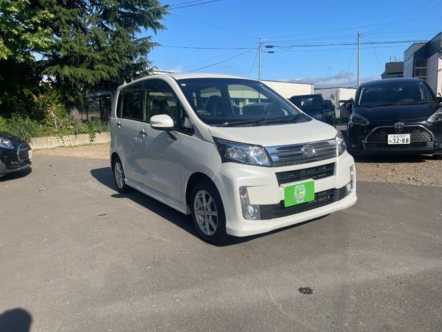 ムーヴ カスタム　Ｘ　４ＷＤ　車検Ｒ８年５月まで　社外フルセグナビ　ＥＴＣ　純正アルミホイール　ＨＩＤヘッドライト　オートエアコン　エコアイドル　チルトステアリング（3枚目）