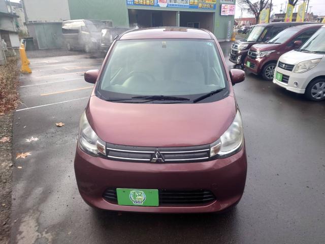 ｅＫワゴン Ｇ　４ＷＤ　車検２年　純正アルミホイール　バックカメラ　プッシュスタート　スマートキー　シートヒーター　電動格納ドアミラー　オートエアコン　ハロゲンヘッドライト　純正ＣＤコンポ（3枚目）