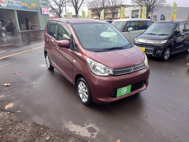 ｅＫワゴン Ｇ　４ＷＤ　車検２年　純正アルミホイール　バックカメラ　プッシュスタート　スマートキー　シートヒーター　電動格納ドアミラー　オートエアコン　ハロゲンヘッドライト　純正ＣＤコンポ（4枚目）