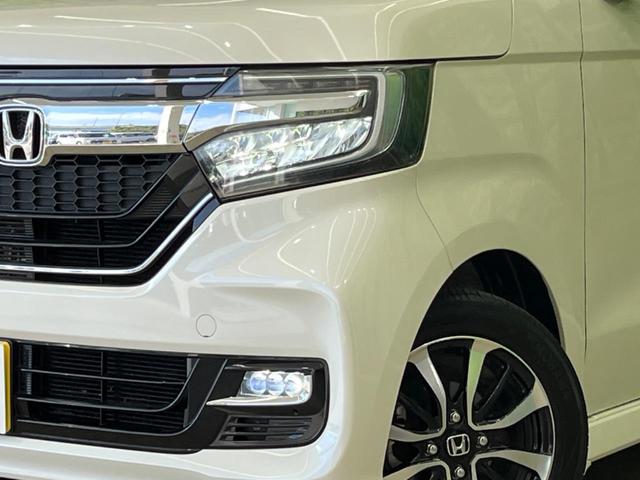 N-BOXカスタム G・Lホンダセンシング 両側電動スライド 純正ナビ バックカメラ ホンダセンシング レーダークルーズ 禁煙車 コーナーセンサー レーンキープ LEDヘッド ETC オートハイビーム 車線逸脱警報 誤発進抑制機能 オートライト(12枚目)