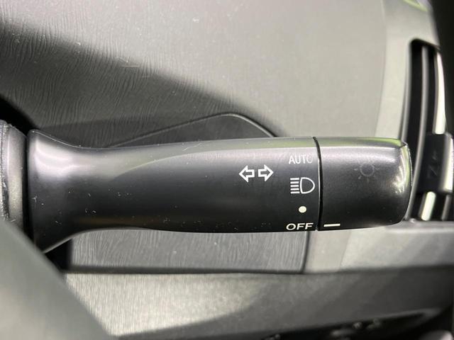 プリウス Ｓ　後期　純正ナビ　バックカメラ　禁煙車　スマートキー　ＨＩＤヘッド　ビルトインＥＴＣ　純正１５インチアルミ　オートライト　オートエアコン　ＣＤ　地デジ　ステアリングスイッチ　トラクションコントロール（57枚目）