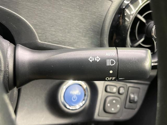 アクア S SDナビ バックカメラ 禁煙車 スマートキー オートライト オートエアコン CD 地デジ 15インチアルミホイル 電動格納ミラー シートリフター ワイパーデアイサー トラクションコントロール(7枚目)