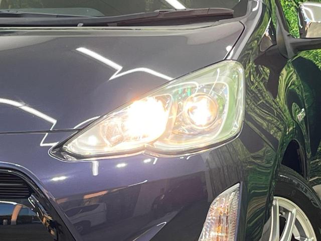 アクア S SDナビ バックカメラ 禁煙車 スマートキー オートライト オートエアコン CD 地デジ 15インチアルミホイル 電動格納ミラー シートリフター ワイパーデアイサー トラクションコントロール(12枚目)