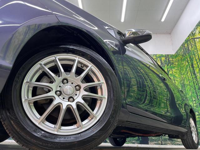 アクア S SDナビ バックカメラ 禁煙車 スマートキー オートライト オートエアコン CD 地デジ 15インチアルミホイル 電動格納ミラー シートリフター ワイパーデアイサー トラクションコントロール(13枚目)