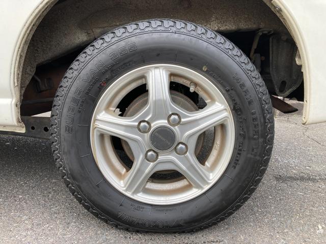 ハイゼットカーゴ デッキバンＧ　４ＷＤ　５速マニュアル　両側スライドドア　前方ドラレコ　ポータブルナビ　荷台マッド　社外アルミ　ＣＤデッキ　シートカバー　車検Ｒ９年１月　パワステ　エアコン　パワーウィンドウ　１７３７１５ｋｍ　軽バン（64枚目）