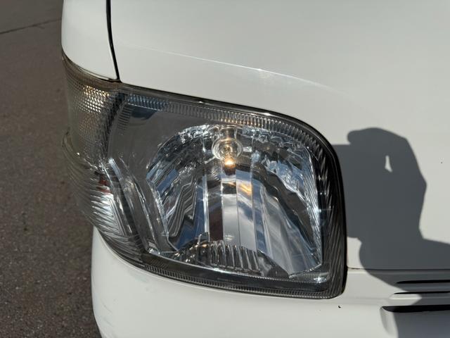 ハイゼットカーゴ スペシャル　保証１年　修復歴無　四駆　ディーラー点検車　純正オーディオ　集中ロック　軽貨物　４ナンバー　黒ナンバー可　両側スライド　車両取説　４ＡＴ　４ＷＤ　２０２４年製グッドイヤー夏タイヤ　ライトレベライザー（69枚目）