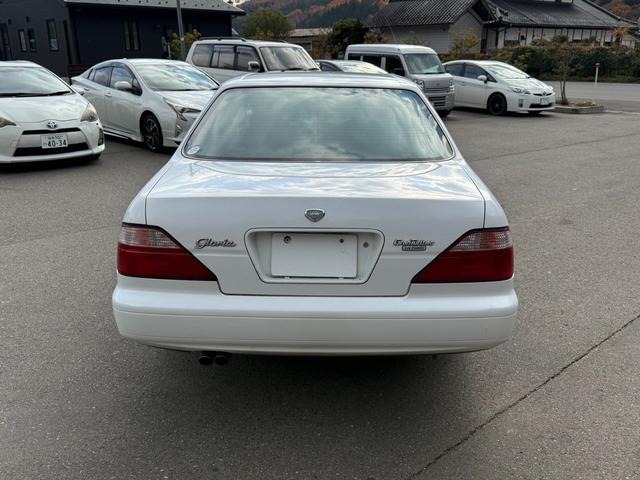 セドリック グランツーリスモアルティマスーパーハイキャス ターボ 修復歴無し 定期点検記録簿 VQ30エンジン ETC キーレス 社外ナビ 元関東登録車サビ無し 車両取説 業者内装クリーニング スペアキー ドラレコ 2022年製夏タイヤ パワーシート(14枚目)