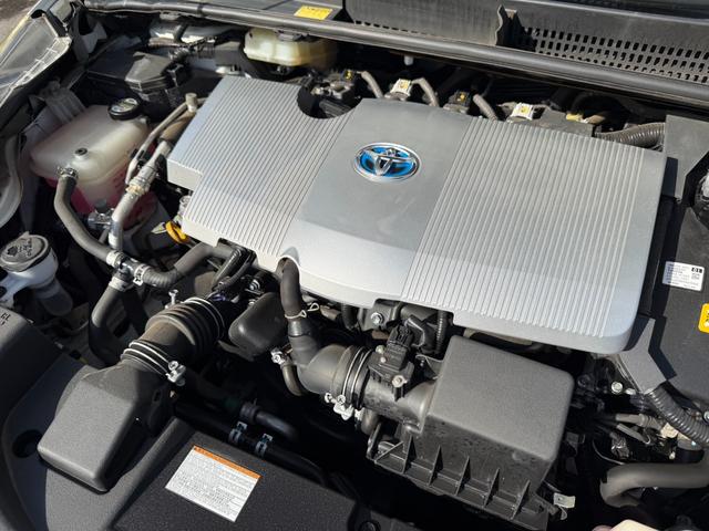 プリウス Ａ　保証１年　走行４．９万ｋ　ディーラー点検車　９インチＳＤナビ　Ｂｌｕｅｔｏｏｔｈ　ＴＶ　バックカメラ　ＥＴＣ　業者内装クリーニング　リチウムイオンＨＶ　ブリヂストン夏タイヤ　ドラレコ　関東仕入サビ無し（64枚目）