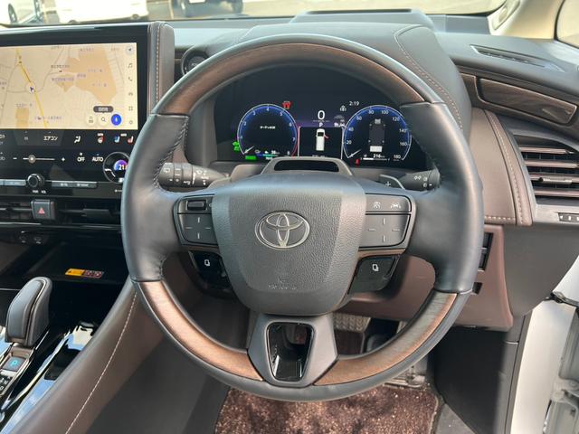 アルファードPHEV エグゼクティブラウンジ トヨタチームメイト セーフティセンス ムーンルーフ メーカー14型ナビTVリヤエンターテイメント JBLサウンド デジタルインナーミラー エグゼクティブラウンジシート ユニバーサルステップ 寒冷地仕様(9枚目)