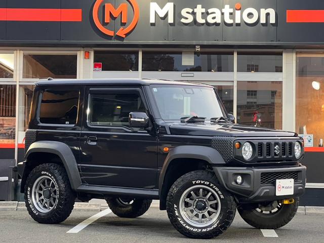 ジムニーシエラ ＪＣ　ワンオーナー　２インチリフトアップ　マッドテレインタイヤ　レイズ１５インチＡＷ　セーフティサポート　クルーズＣ　ダウンヒルアシスト　純正ナビフルセグＢカメラ　シートカバー（3枚目）