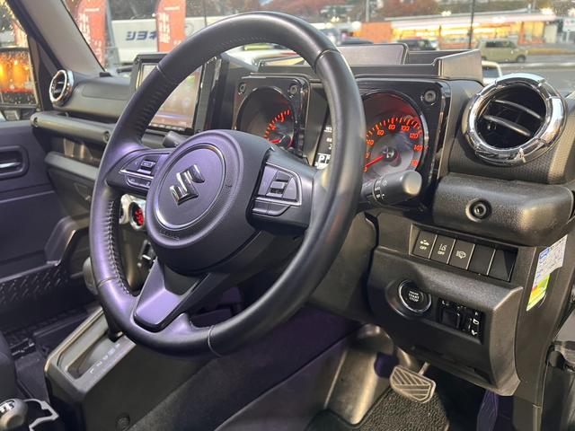 ジムニーシエラ ＪＣ　ワンオーナー　２インチリフトアップ　マッドテレインタイヤ　レイズ１５インチＡＷ　セーフティサポート　クルーズＣ　ダウンヒルアシスト　純正ナビフルセグＢカメラ　シートカバー（10枚目）