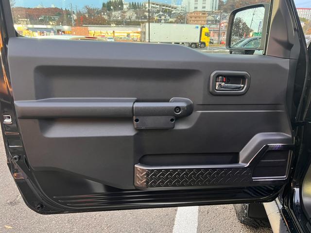 ジムニーシエラ ＪＣ　ワンオーナー　２インチリフトアップ　マッドテレインタイヤ　レイズ１５インチＡＷ　セーフティサポート　クルーズＣ　ダウンヒルアシスト　純正ナビフルセグＢカメラ　シートカバー（29枚目）