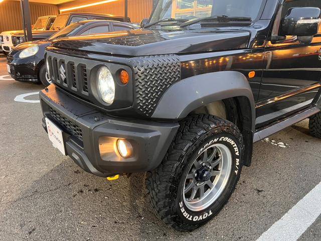 ジムニーシエラ ＪＣ　ワンオーナー　２インチリフトアップ　マッドテレインタイヤ　レイズ１５インチＡＷ　セーフティサポート　クルーズＣ　ダウンヒルアシスト　純正ナビフルセグＢカメラ　シートカバー（38枚目）