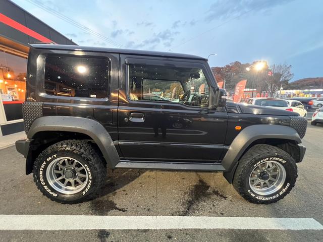 ジムニーシエラ ＪＣ　ワンオーナー　２インチリフトアップ　マッドテレインタイヤ　レイズ１５インチＡＷ　セーフティサポート　クルーズＣ　ダウンヒルアシスト　純正ナビフルセグＢカメラ　シートカバー（39枚目）